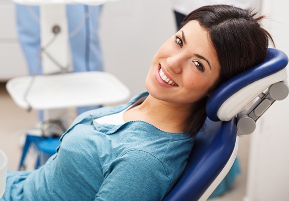 Smiling woman in dental chair