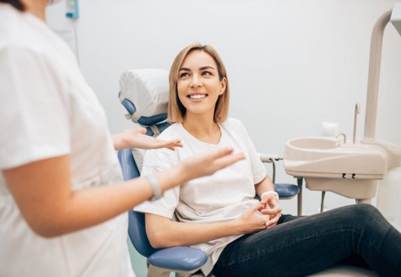 Patient smiles at dentist