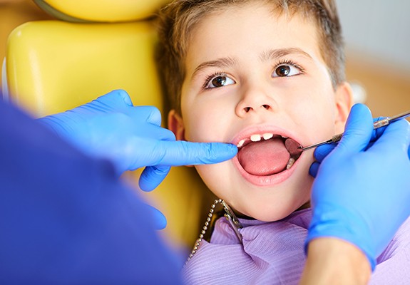 Child receiving dental exam