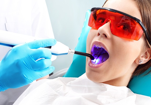 Young girl receiving dental sealants