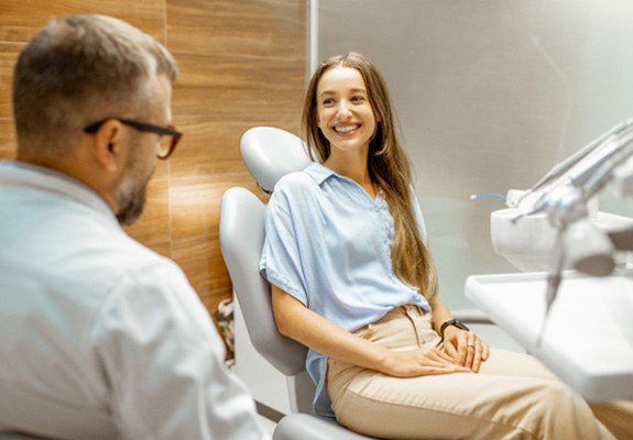 Patient smiling while talking to cosmetic dentist in Fanwood 