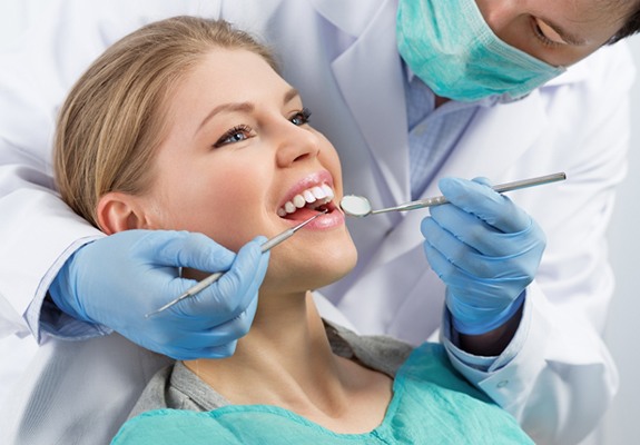 A woman in the dentist chair