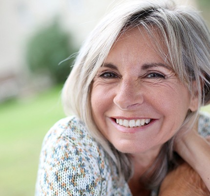 a person showing off her healthy smile