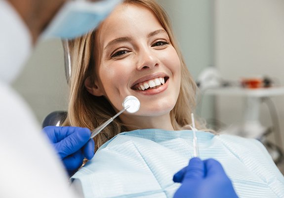 Woman about to receive gum disease treatment