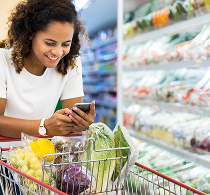 a woman grocery shopping