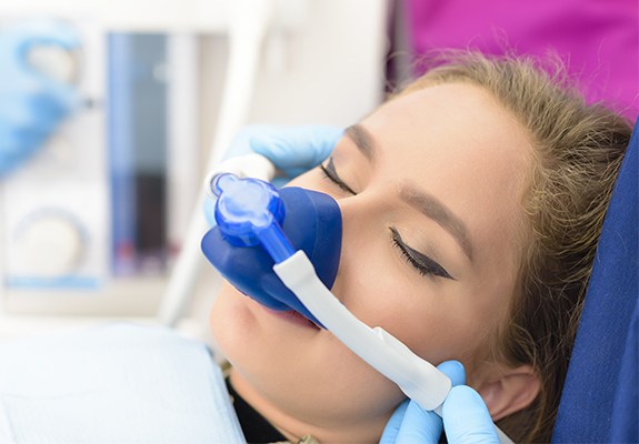 Patient with nitrous oxide nose mask