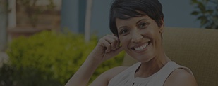 Smiling older woman outdoors