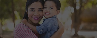 Woman holding her child