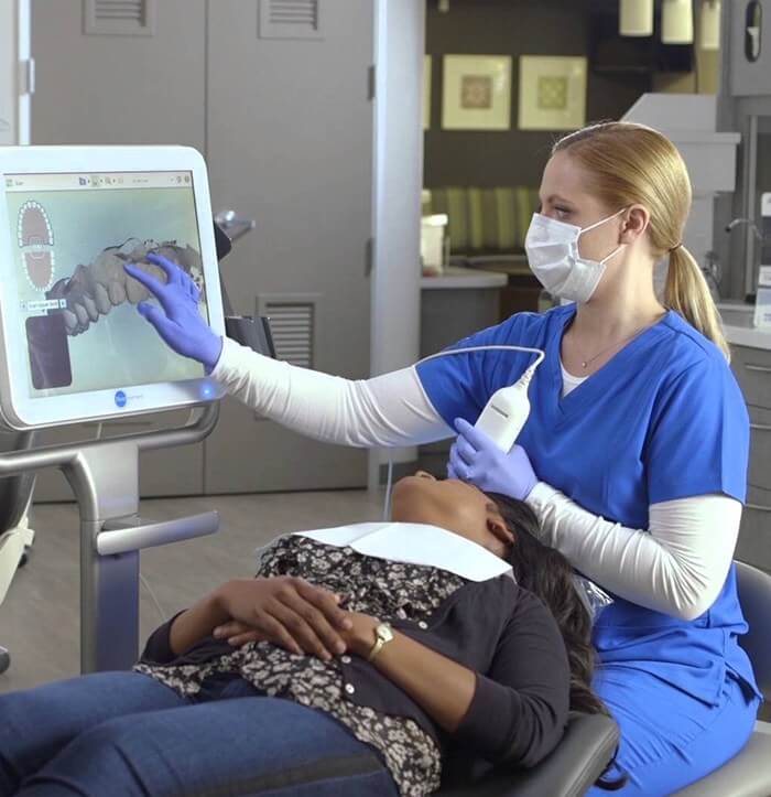 Fanwood dental team member capturing images of a patients smile