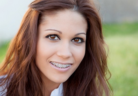 A young girl with braces