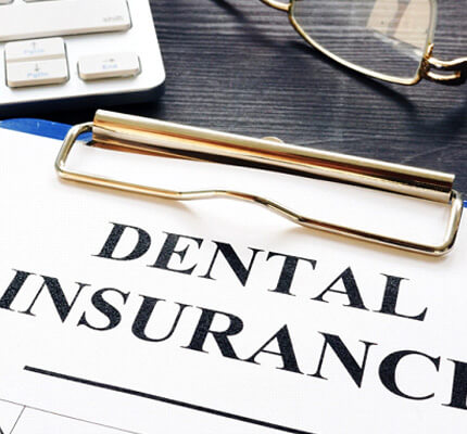close-up of dental insurance form on a clipboard