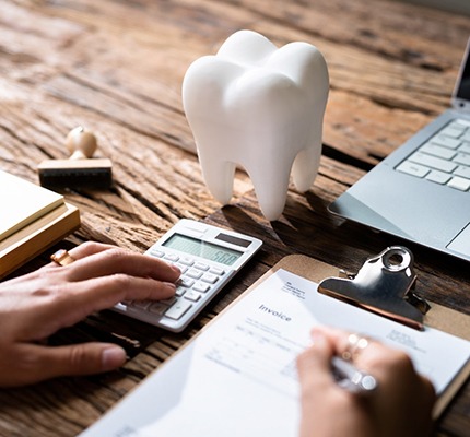 Tooth mold with paperwork and computer