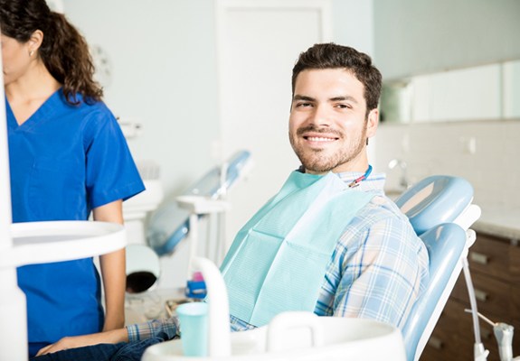 Man smiling in dental chair