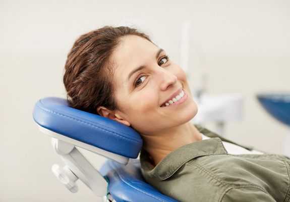 Woman smiling in dental chair