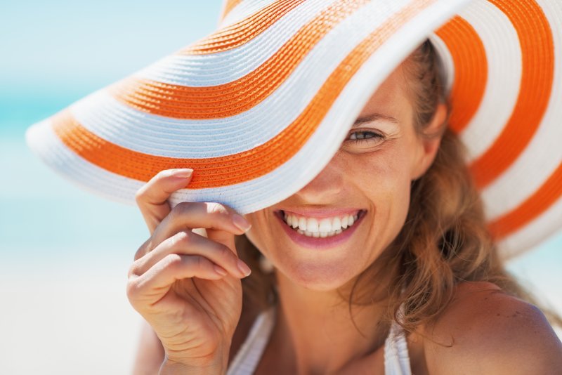 young woman smiling during summertime