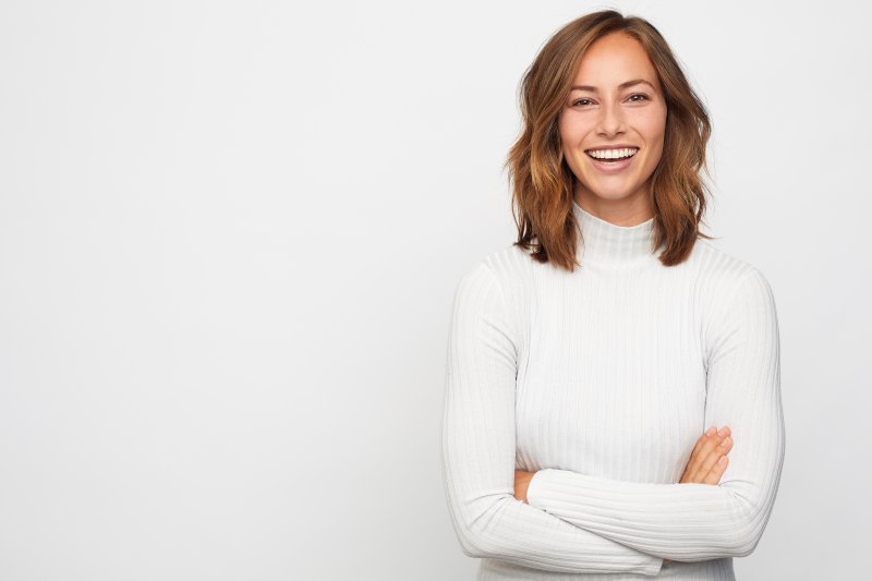 a woman smiling after getting cosmetic dentistry in Fanwood