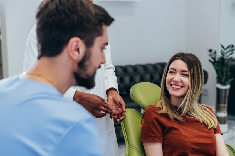 a patient asking questions about a smile makeover in Fanwood